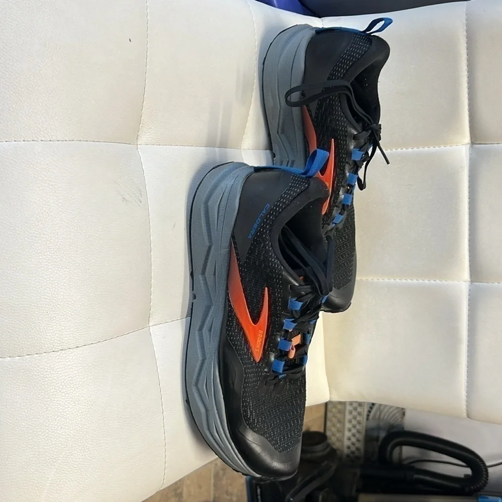 Brooks black with orange and blue detail men’s size 10 CALDERA, edition sneaker
